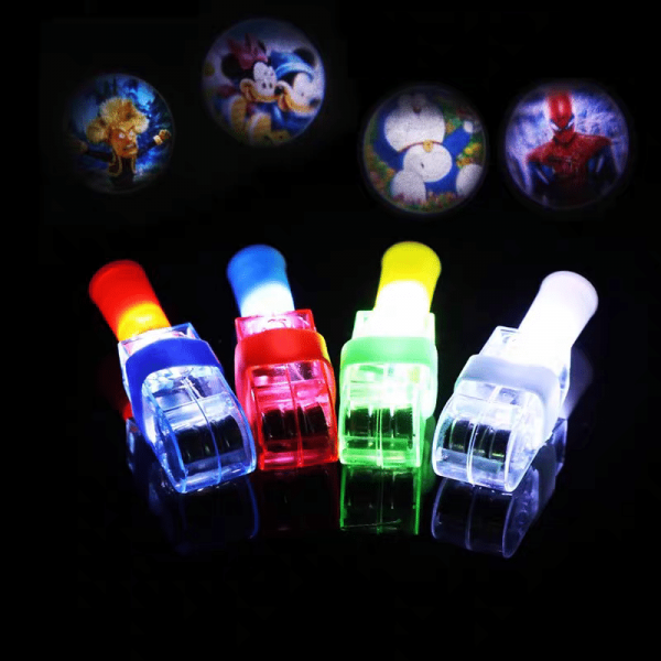 Four handheld projectors in red, blue, green, and white are set against a black backdrop, each displaying vibrant cartoon images. These scenes capture the charm of LED Cartoon Character Finger Rings.